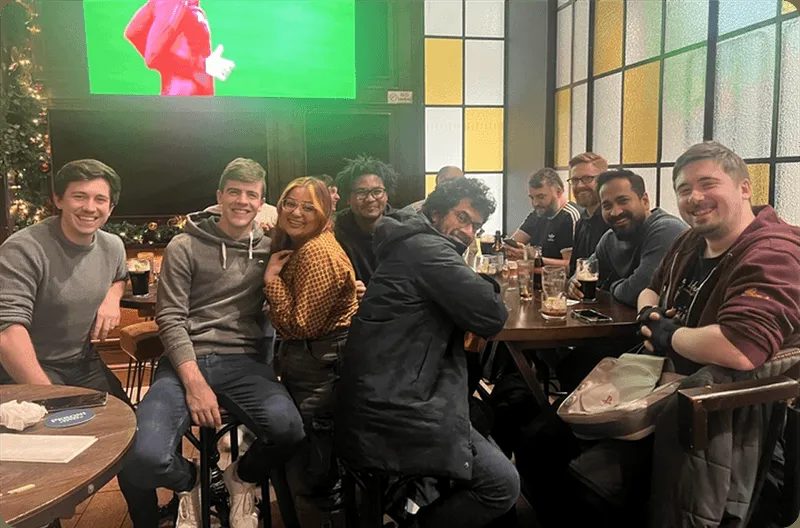 Kubicle team members in conversation.